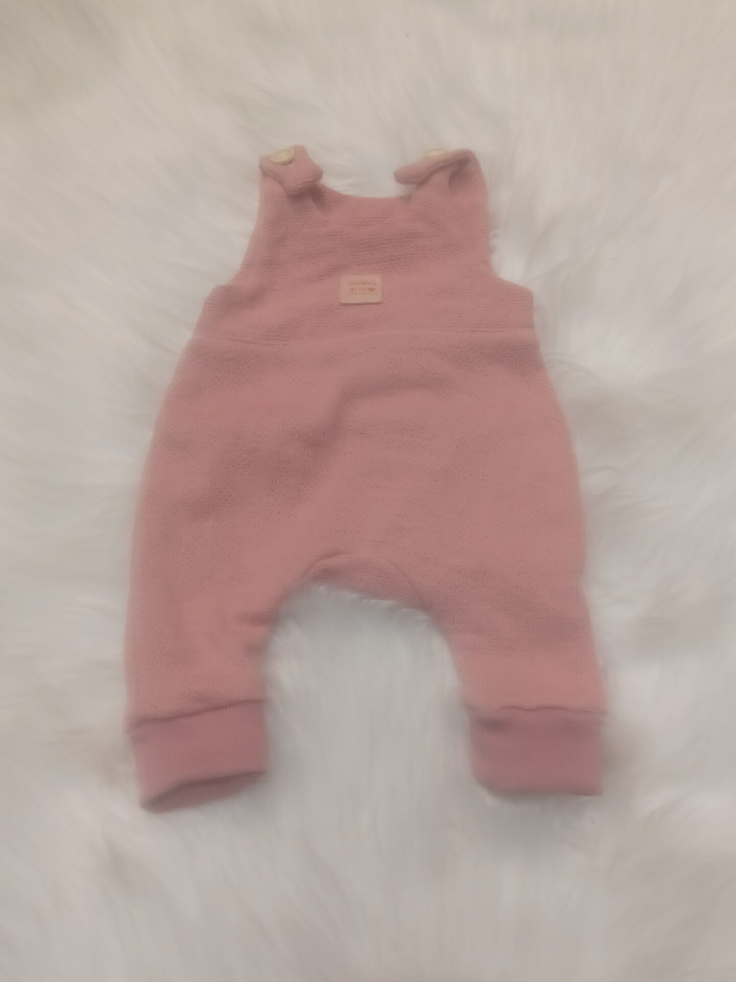 Strampler Strick malve mit Bündchen